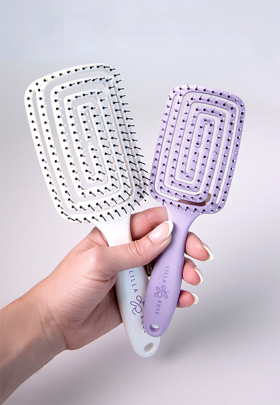 Flexi Brush has a curved comb shape with a flexible body