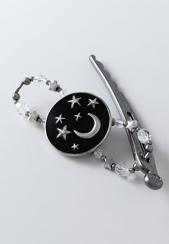 Flexi hair clip  with moon and stars shine bright through the dark night sky with accents of aurora borealis and star shaped beads