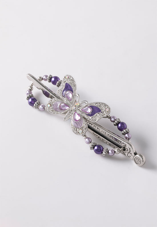 Flexi with butterfly and delicately detailed wings and lavender and purple pearls.