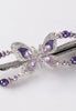 Flexi with butterfly and delicately detailed wings and lavender and purple pearls.