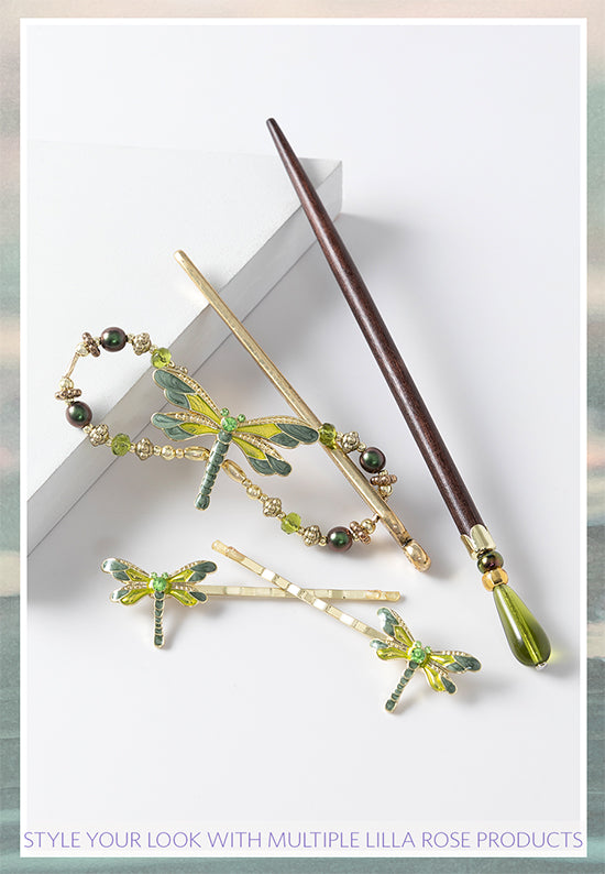 Collection of coordinating green and brass hair accessories.