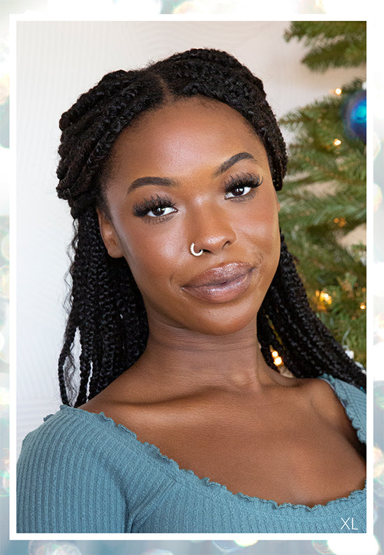 black woman with black braided locs