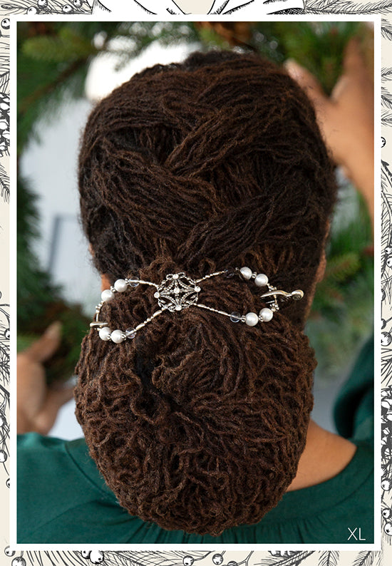 Antique wreath adorned with crystals and pearl accents shown in Sister Locs