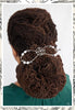 Antique wreath adorned with crystals and pearl accents shown in Sister Locs