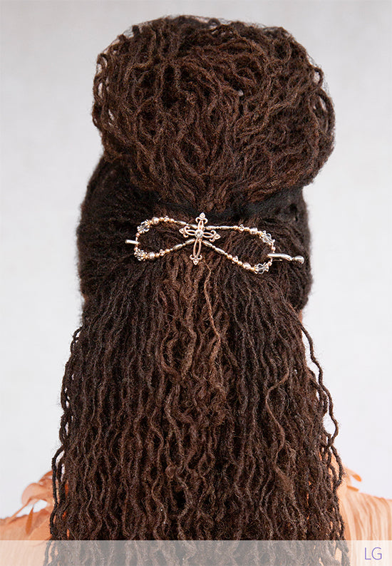 Beautiful cross design with mixed metal and clear crystal accents shown in Sister Locs