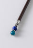 Harlowe hair stick features a beautiful combination of dark blue dolomite and blue apatite natural stones.