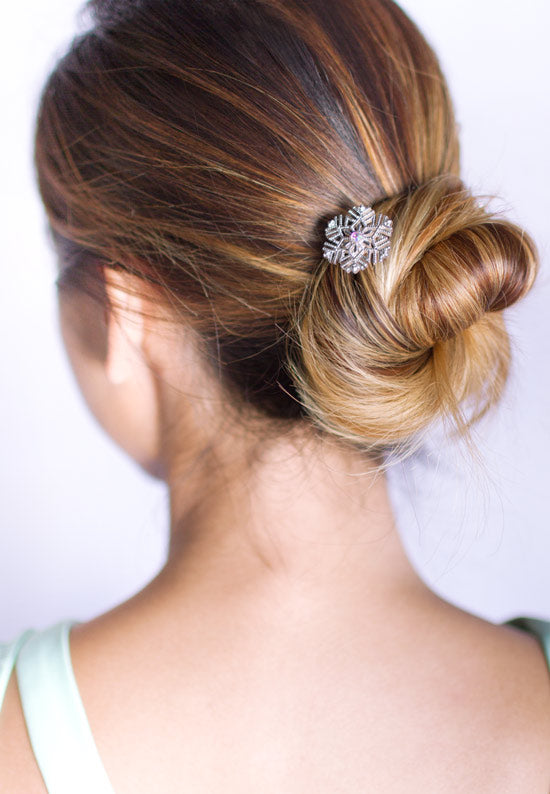 Snowflake hair pin with aurora borealis stoneset.