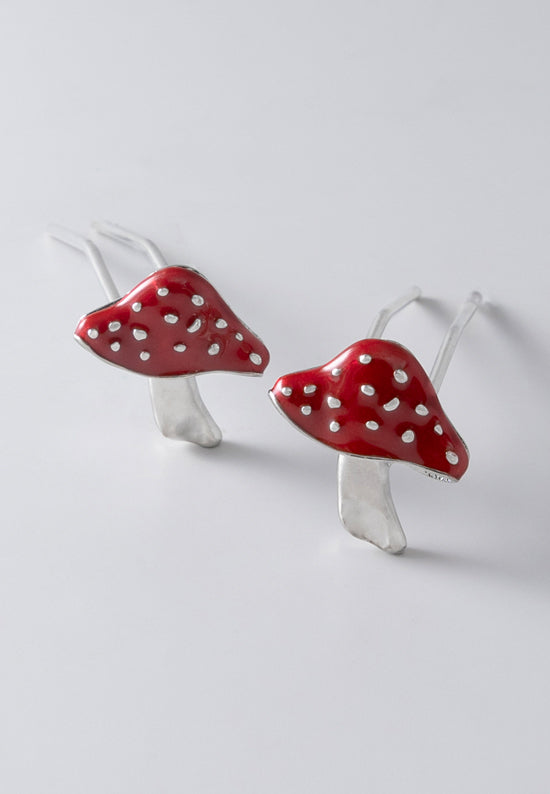 Enchanting mushroom with a red cap and silvertone accents Upin