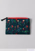 decorative holiday print Lilla Rose zipper pouch in red and greens.