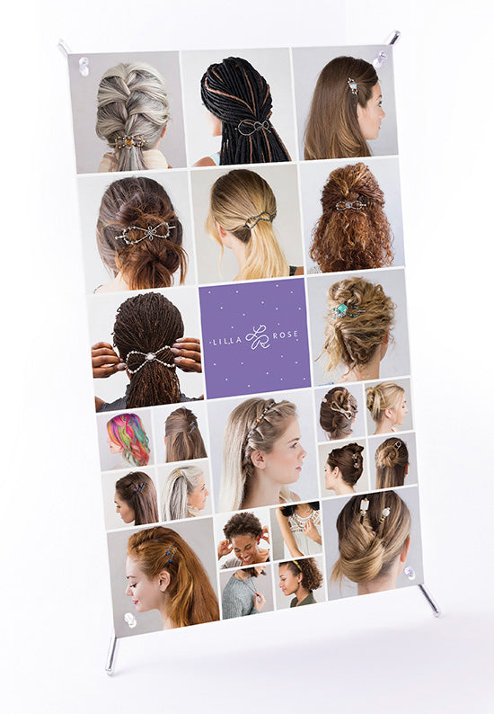 Lilla Rose Table top banner showing different products in hair.